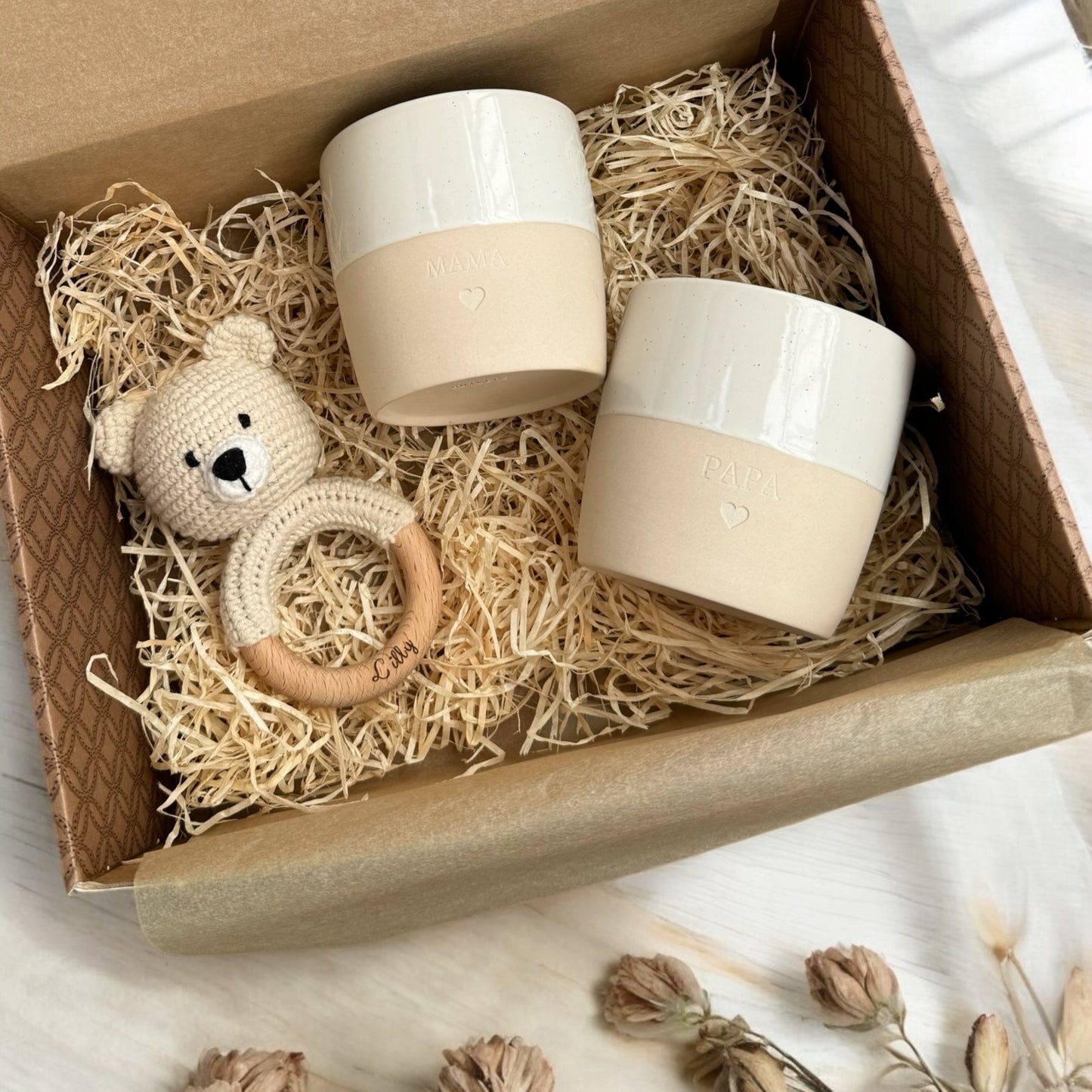 Geschenk für frischgebackene Eltern und Baby
