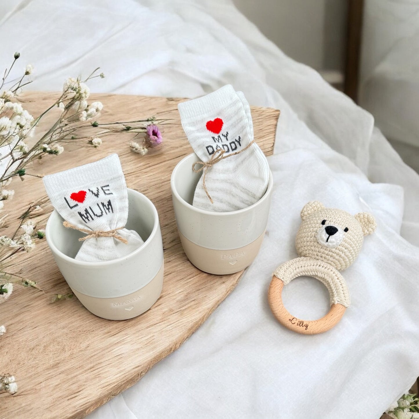 Geschenk für frischgebackene Eltern und Baby