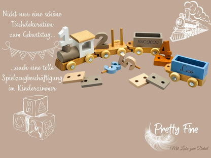 bunter Geburtstagszug mit. Kerze